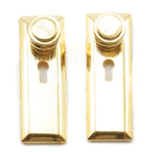 May include: Two gold-colored rectangular door plates with integrated round knobs and keyholes, flanked by two separate gold-colored skeleton keys. The hardware features a polished metallic finish and a classic rectangular design for door mounting.
