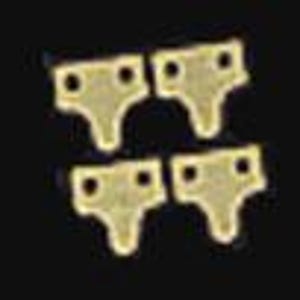 May include: Four small, T-shaped brass-coloured metal fasteners arranged in a two-by-two grid. Each piece features a flat top section with two circular holes and a downward-pointing tab, displaying a textured, metallic surface finish throughout.