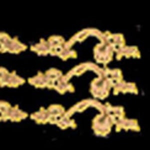 May include: Six gold-toned metal drawer pulls featuring an ornate, curved handle design with decorative backplates on each side. The set includes a small collection of matching gold-toned screws for installation, arranged to the right of the pulls.