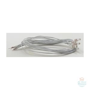 May include: A bundle of thin white electrical wires connected to small clear LED bulbs at one end. The wires are coiled together, and the opposite ends show exposed copper wiring. A small logo in the corner reads AAM All About Miniatures.