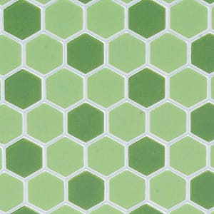 May include: Close-up of a mosaic tile pattern featuring a repeating hexagonal design. The tiles are a mix of light and dark green, with white grout lines separating each tile. The pattern creates a visually appealing, geometric texture.