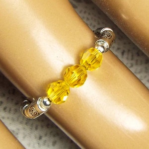 Cynthia Lynn &quot;CELEBRATE&quot; Swarovski Crystal Citrine Gold November Birthstone Silver Stretch Ring