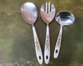 Vintage Casualware Stainless Steel serving set meat fork, large spoon, small ladle all with spice of life design 1971