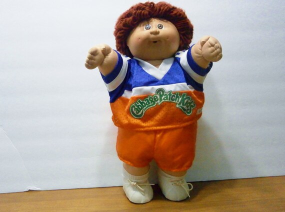 brown haired cabbage patch doll boy