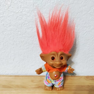 Ace Novelty Treasure Trolls 4 inch orange hair orange diamond shaped  jewel belly button with jumper outfit from the 1990's