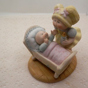 Vintage 1984 Cabbage Patch Kids Figurine: Baby in Cradle