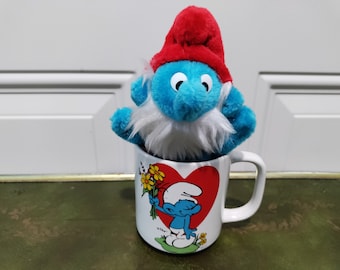 Vintage Papa Smurf plush 7 inch with vintage Peyo Coffee cup both from Wallace Berrie and company 1981