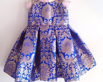 Royal blue brocade dress with bow at the back
