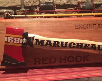 Personalized firefighter graduation or retirement axe.