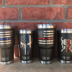 Firefighter and Police YETI cup with thin red or blue line laser engraved and powder coated line. This Iisting includes shipping prices