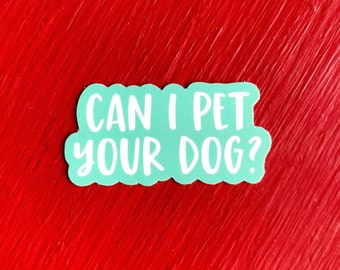 May include: A teal blue sticker with white text that reads "Can I pet your dog?"