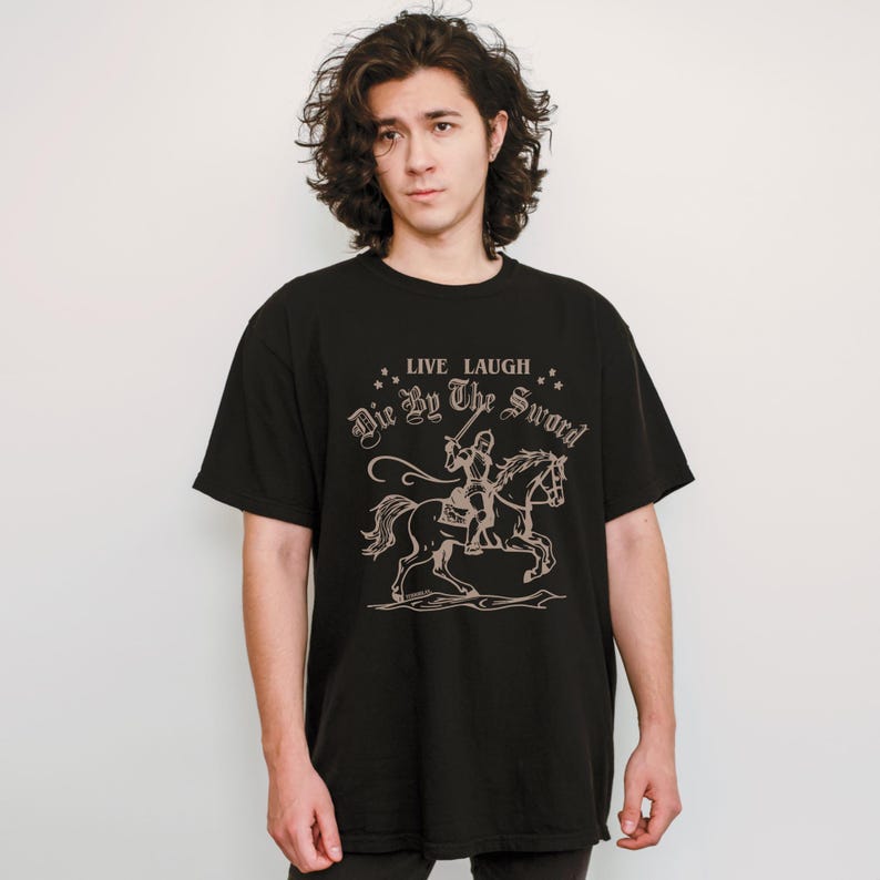 live laugh die by the sword. funny medieval meme graphic tee for the ren faire. trendy for men and women. oversize fit. comfort color t-shirt available in plus sizes.