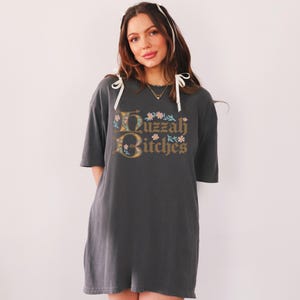 huzzah bitches funny medieval meme graphic tee on a comfort color t-shirt available in plus sizes and gender neutral