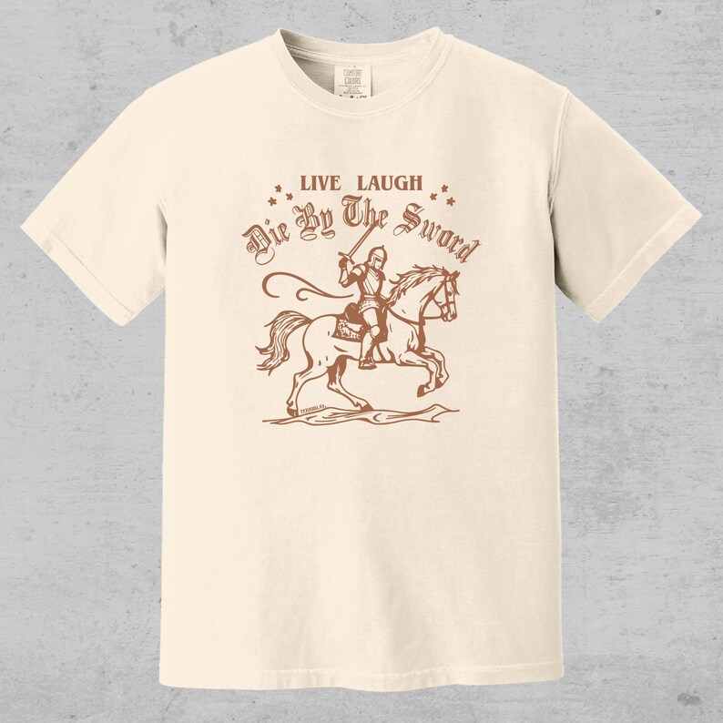 live laugh die by the sword. funny medieval meme graphic tee for the ren faire. trendy for men and women. oversize fit. comfort color t-shirt available in plus sizes.