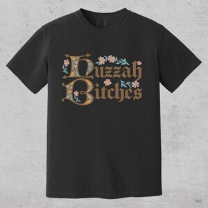 huzzah bitches funny medieval meme graphic tee on a comfort color t-shirt available in plus sizes and gender neutral