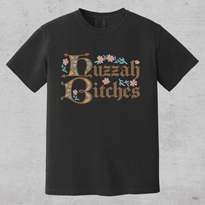 huzzah bitches funny medieval meme graphic tee on a comfort color t-shirt available in plus sizes and gender neutral