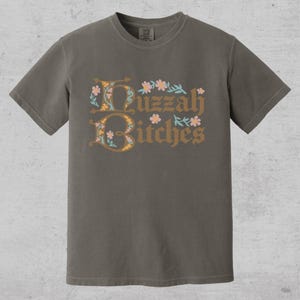 huzzah bitches funny medieval meme graphic tee on a comfort color t-shirt available in plus sizes and gender neutral
