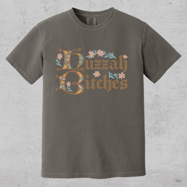 huzzah bitches funny medieval meme graphic tee on a comfort color t-shirt available in plus sizes and gender neutral