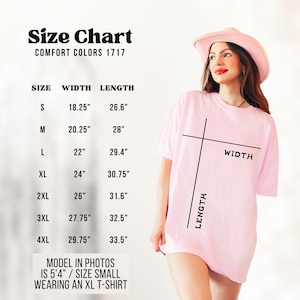 May include: A light pink Comfort Colors 1717 t-shirt with a size chart. The chart shows measurements for sizes S to 4XL, with widths ranging from 18.25" to 29.75" and lengths from 26.6" to 33.5". The model in the photo is 5'4" and wearing an XL t-shirt.