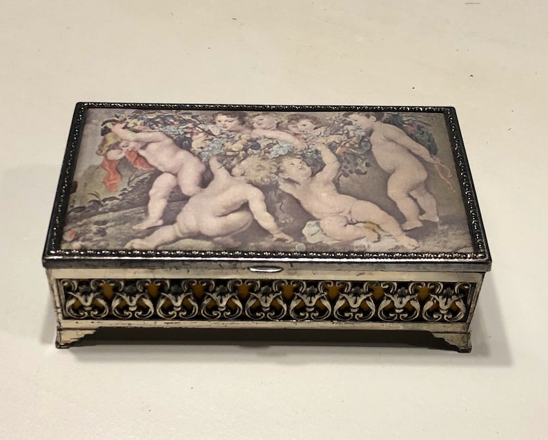 Old World\u201d Jewelry Box gold velvet lined with Victorian silk print on lid.