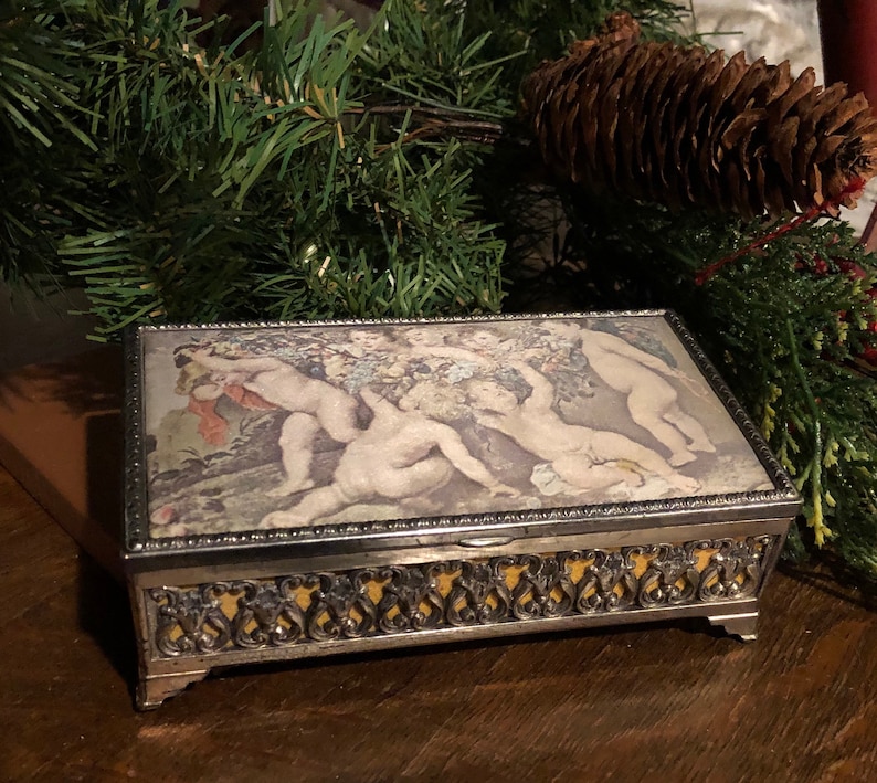 Old World\u201d Jewelry Box gold velvet lined with Victorian silk print on lid.