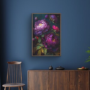 May include: A framed print of a floral still life featuring purple and pink peonies with green leaves on a dark background.
