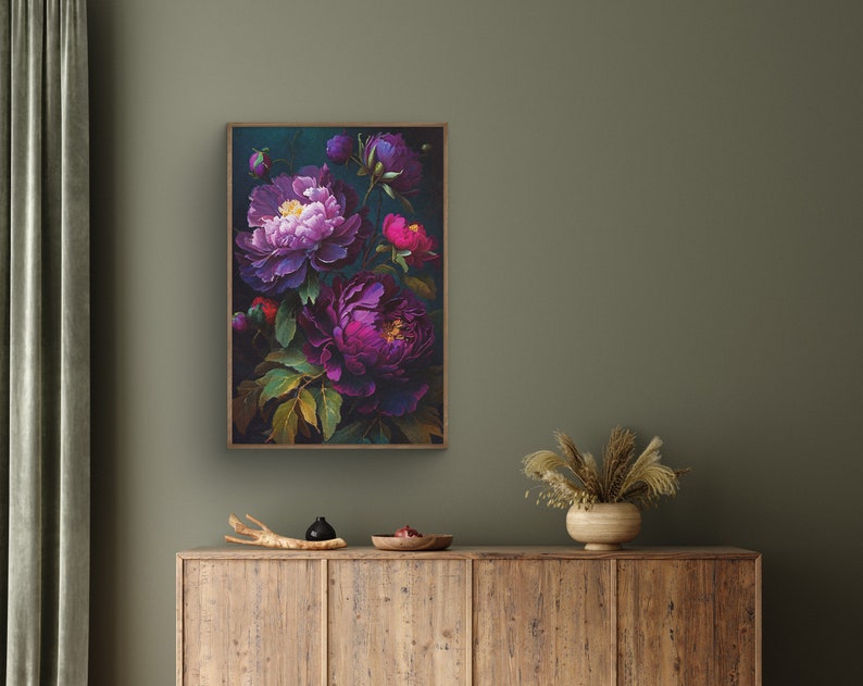 May include: A framed print of a dark floral still life featuring purple and pink peonies on a dark background.