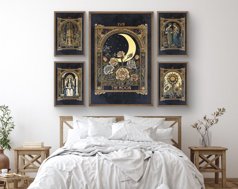 May include: Set of six framed tarot card prints with gold accents. The prints feature illustrations of the Tower, The Empress, The Moon, The Lovers, The Sun, and The High Priestess. Each print has a title and Roman numeral.