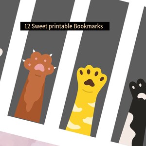 May include: Twelve printable bookmarks featuring different colored cat paws with pink paw pads. The bookmarks are on a gray background with the text "12 Sweet printable Bookmarks" at the top.