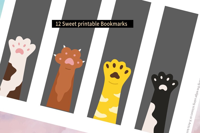 May include: Twelve printable bookmarks featuring different colored cat paws with pink paw pads. The bookmarks are on a gray background with the text "12 Sweet printable Bookmarks" at the top.