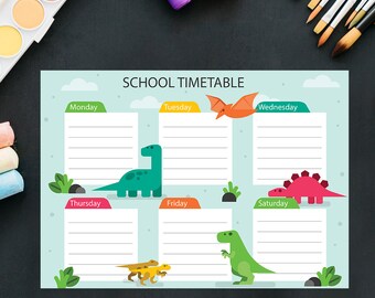 May include: A colorful dinosaur-themed school timetable with days of the week labeled in green, orange, and teal. Each day has a lined space for writing in activities. The timetable features illustrations of dinosaurs, including a green dinosaur, a pink dinosaur, and a yellow dinosaur.