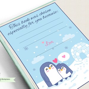 May include: A blue bookplate with a penguin family and an igloo. The text reads "This book was chosen especially for you because: Love,".