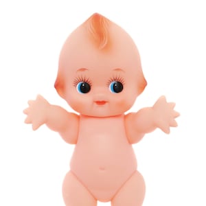Muñeco de goma antiguo best sale