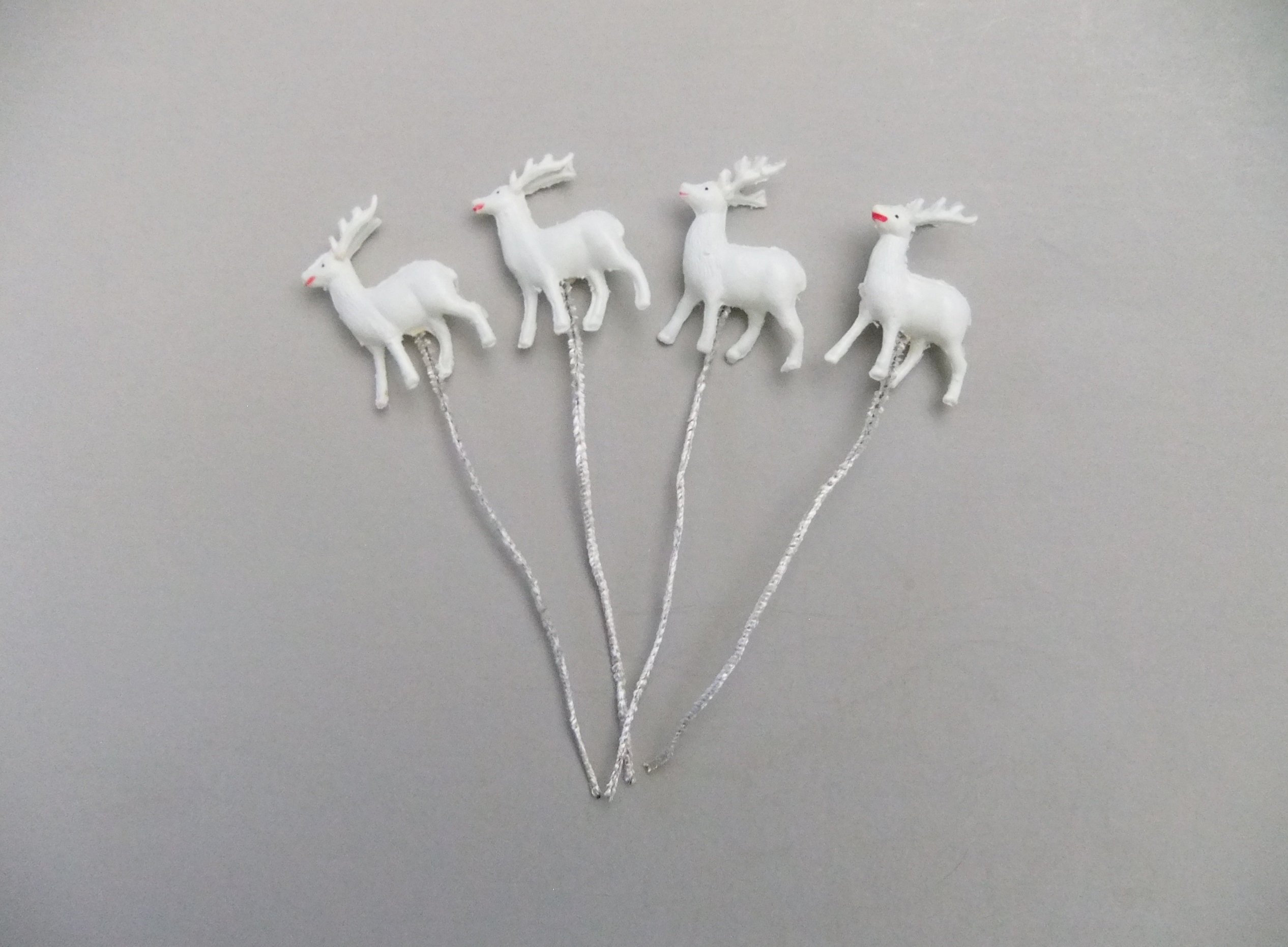 tiny reindeer figurines
