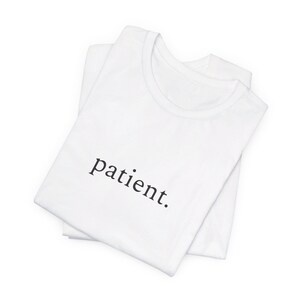 patient - One Word Minimalist Unisex Jersey Short Sleeve Tee