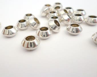 Silver Tone Large Hole Metal Beads_PM5105664722458_Silver Metal Beads of 7x4 mm hole 3 mm pack 50 pcs