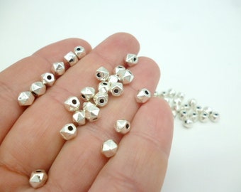 Small Faceted Silver tone Metal beads_NAC610089337/2214_Irregular metal bead of 4X4 mm hole 1.2 mm _pack 70 pcs