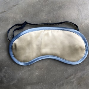 sleeping mask from silk, cream, blue edge, silk, travel, beauty, relaxation, adjustable image 1