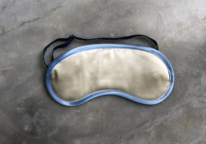 sleeping mask from silk, cream, blue edge, silk, travel, beauty, relaxation, adjustable image 1