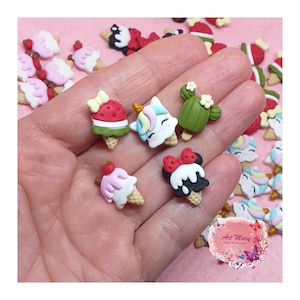 May include: Assortment of colorful ice cream cone charms with various designs, including a watermelon, a unicorn, a cactus, and a Mickey Mouse head. The charms are made of polymer clay and are perfect for adding a whimsical touch to crafts and jewelry.