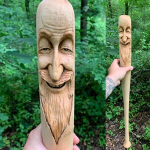 baseball bat wood carving of a face wood spirit carving hand carved wood art by Josh Carte Unique Art made in Ohio handmade woodworking