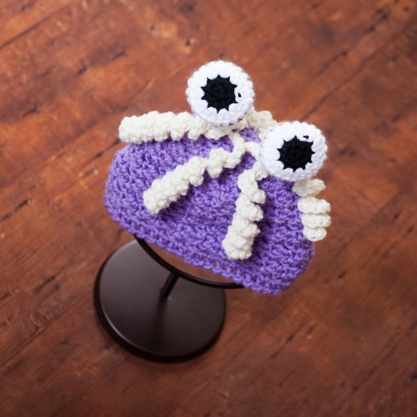 Adorable hat for your little one!  Made in the likeness of Boo from Monsters Inc!