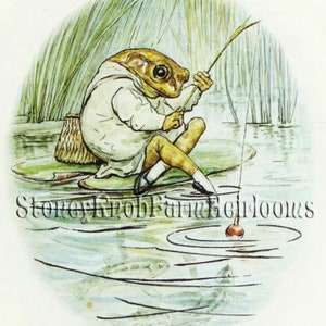 May include: A watercolor illustration of a frog wearing a white shirt and pants, sitting on a lily pad and fishing with a rod and line. The frog has a red bobber on the end of the line. The illustration is set against a background of green reeds and blue water.
