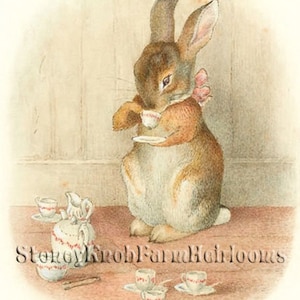 May include: A brown rabbit with a pink bow sits at a table with a teacup and saucer. There are several other teacups and saucers on the table, as well as a teapot.