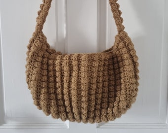 Handmade brown crochet popcorn puff stitch fabric-lined zipper shoulder bag