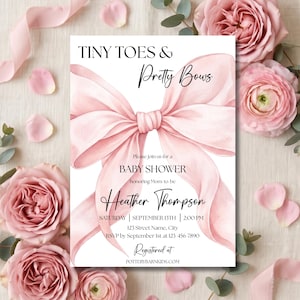 May include: A rectangular baby shower invitation card featuring a large, soft pink watercolor bow illustration. The text reads: TINY TOES & Pretty Bows, Please join us for a BABY SHOWER honoring Mom to be Heather Thompson, SATURDAY SEPTEMBER 13TH 2:00 PM, 123 Street Name, City, RSVP by September 1st at 123-456-7890, Registered at POTTERYBARNKIDS.COM.