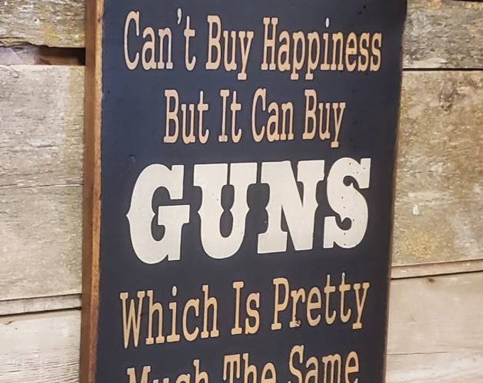 Money Can't Buy Happiness, But It Can Buy Guns, Which Is Pretty Much The Same Thing, Humorous, Western, Antiqued, Wooden Sign in BLACK