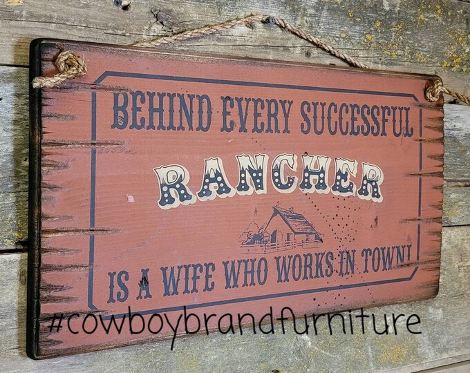 Behind Every Successful Rancher, Is A Wife Who Works In Town, Humorous, Western, Antiqued, Wooden Sign