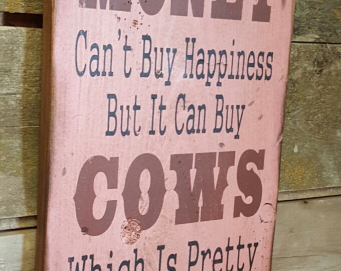 Money Can't Buy Happiness, But It Can Buy Cows, Which Is Pretty Much The Same Thing, Humorous, Western, Antiqued, Wooden Sign in PINK