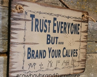 Confía en todos, pero… marca tus pantorrillas, letrero de madera antiguo del oeste